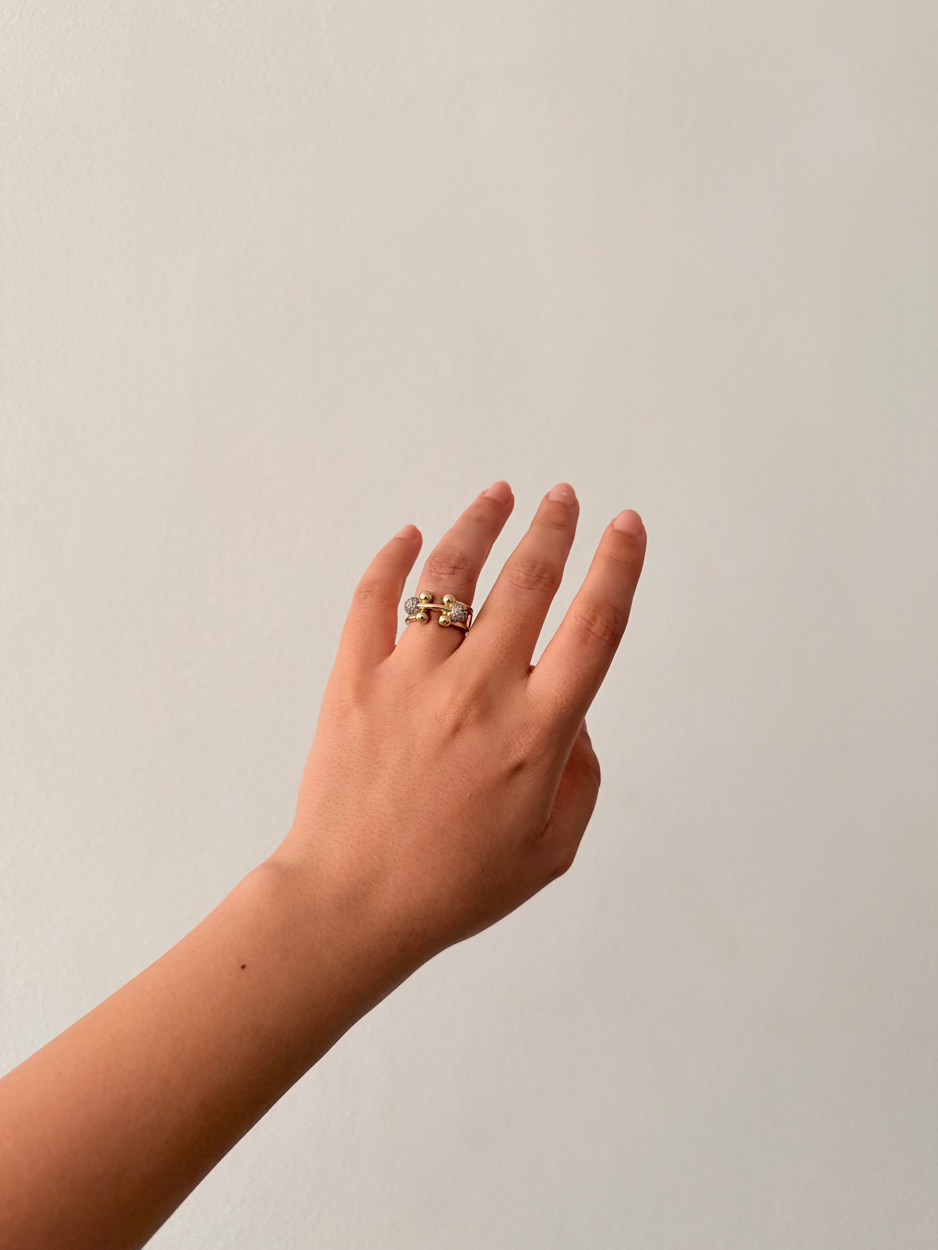 The silver clip gold ring